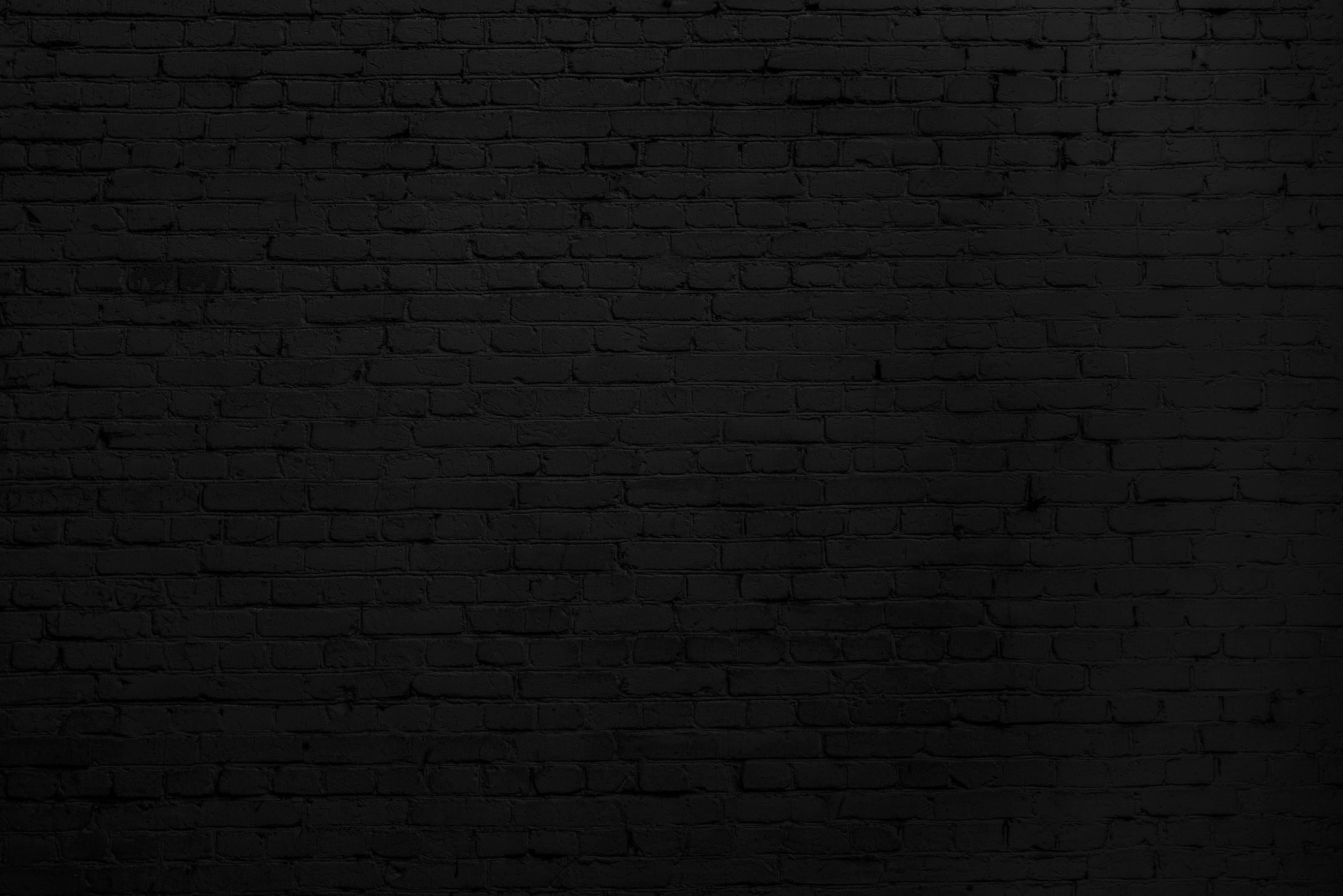Black brick wall.